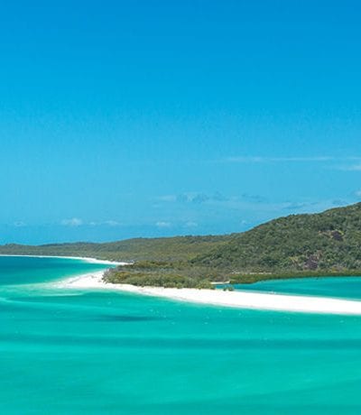 an island in the middle of a body of water.